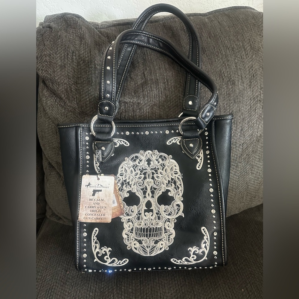 Montana west sugar skull tote bag.  Conceal and carry
